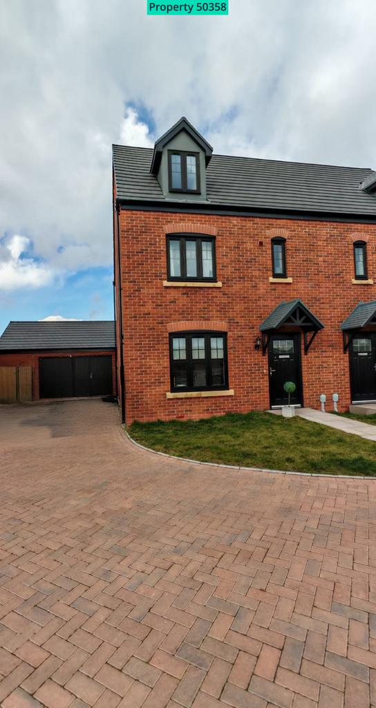 FRONTAGE SHOWING DRIVEWAY &amp; GARAGE