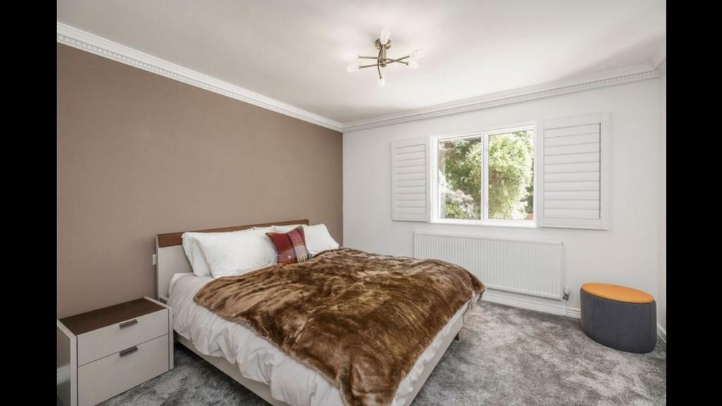 Brown throw windows open