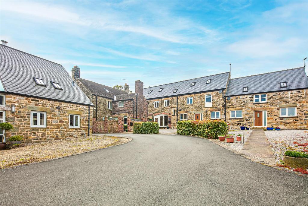 View towards house from parking area