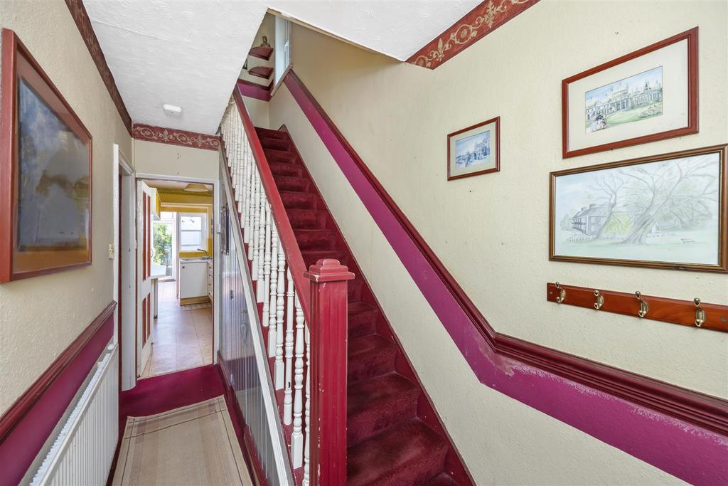 Stairs rising to First Floor