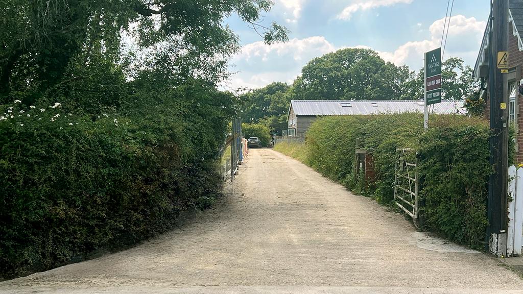 Concrete track access from Brickhouse Lane.