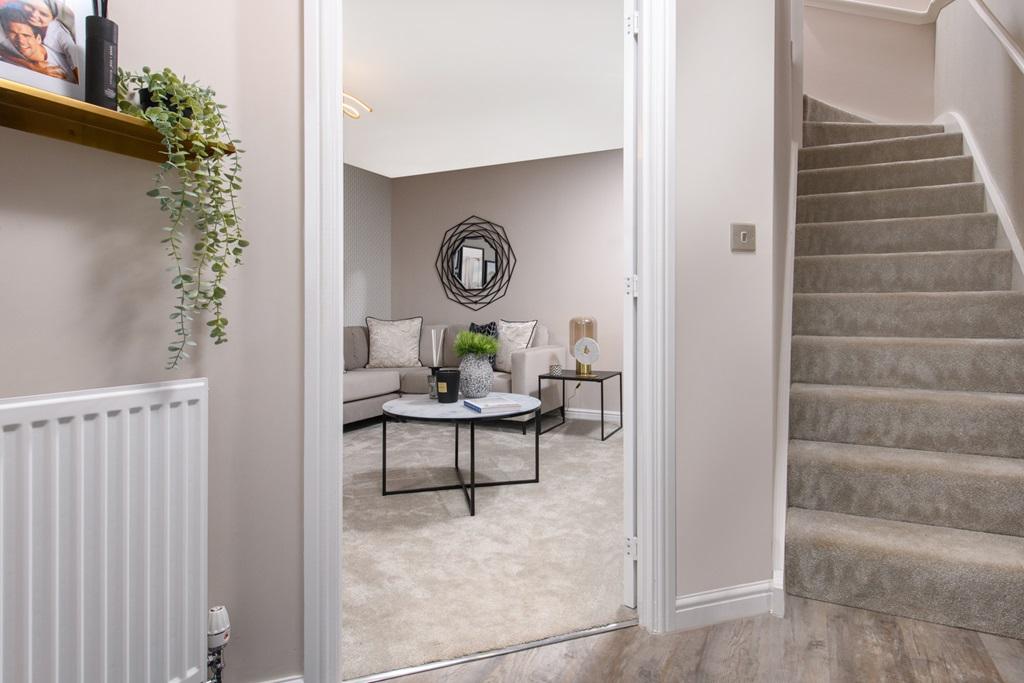 The hallway with the view into the living area