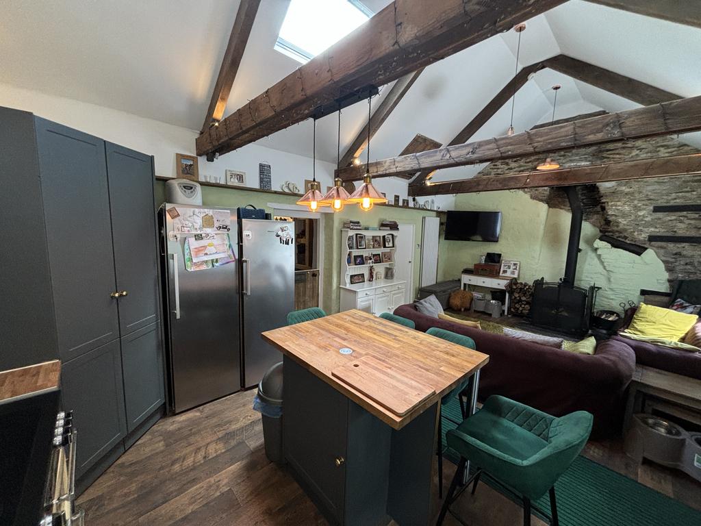 Open plan living area (third image)