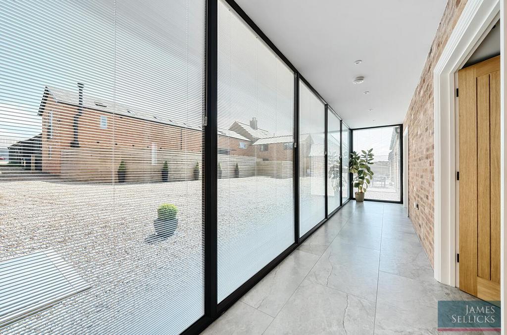 Full height glazed walkway