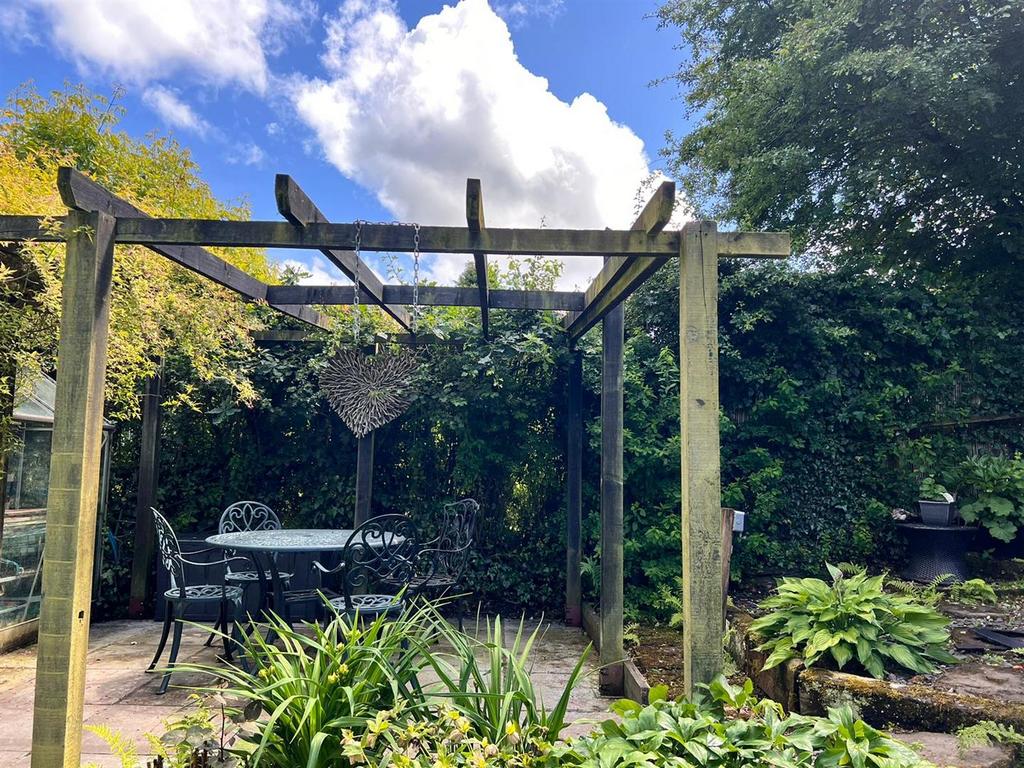 Arbour covered seating area