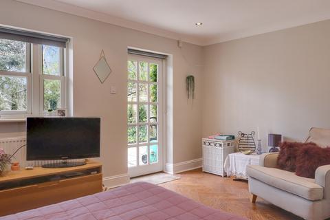Cleves, 21 Matham Road, East Molesey, KT8 0SX