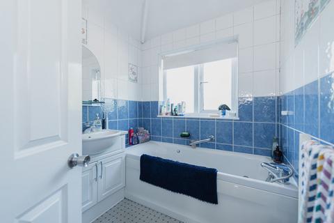 49 Balmoral Crescent, West Molesey, KT8 1QA