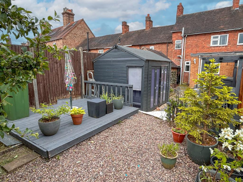 Garden bar and decking area blue sky