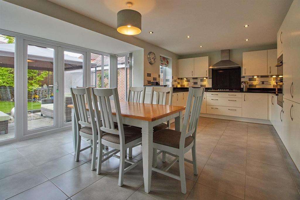 Fitted open plan living dining kitchen to rear