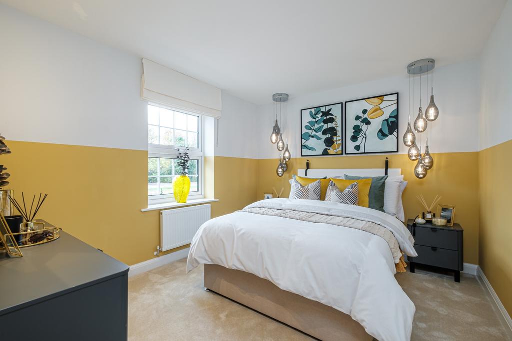 Double bedroom, the bottom half is painted yellow