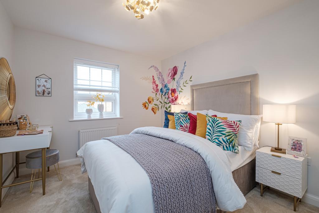 Double bedroom with floral wall mural