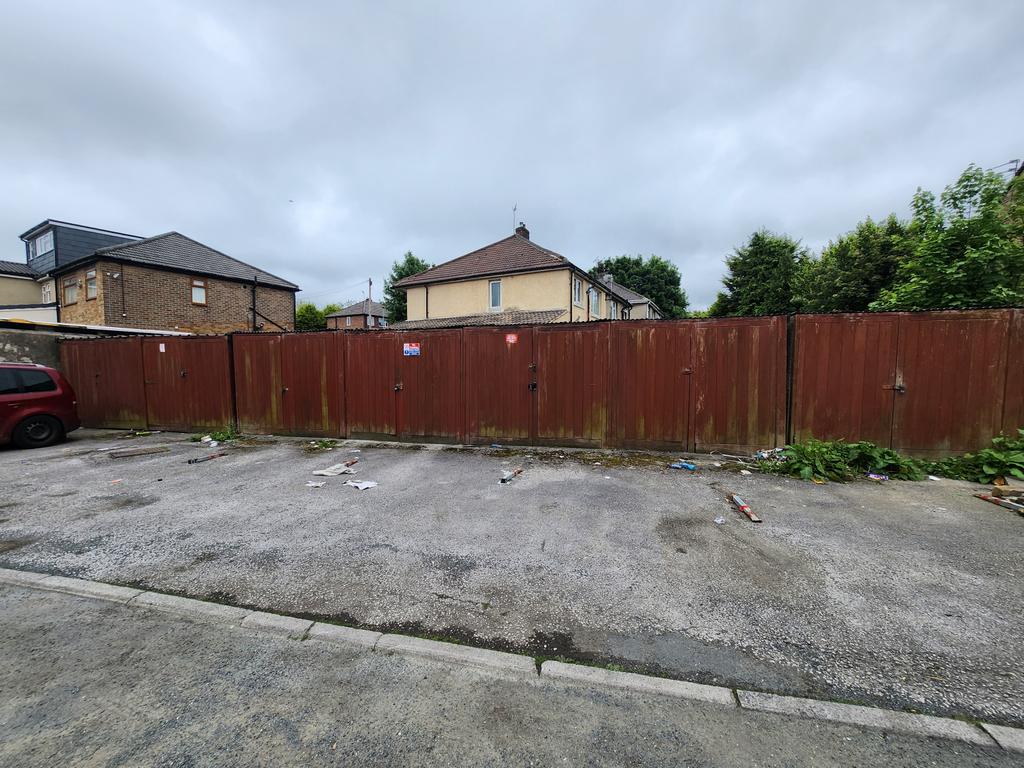 Plot of land in BD5 Conversion of eight garages t