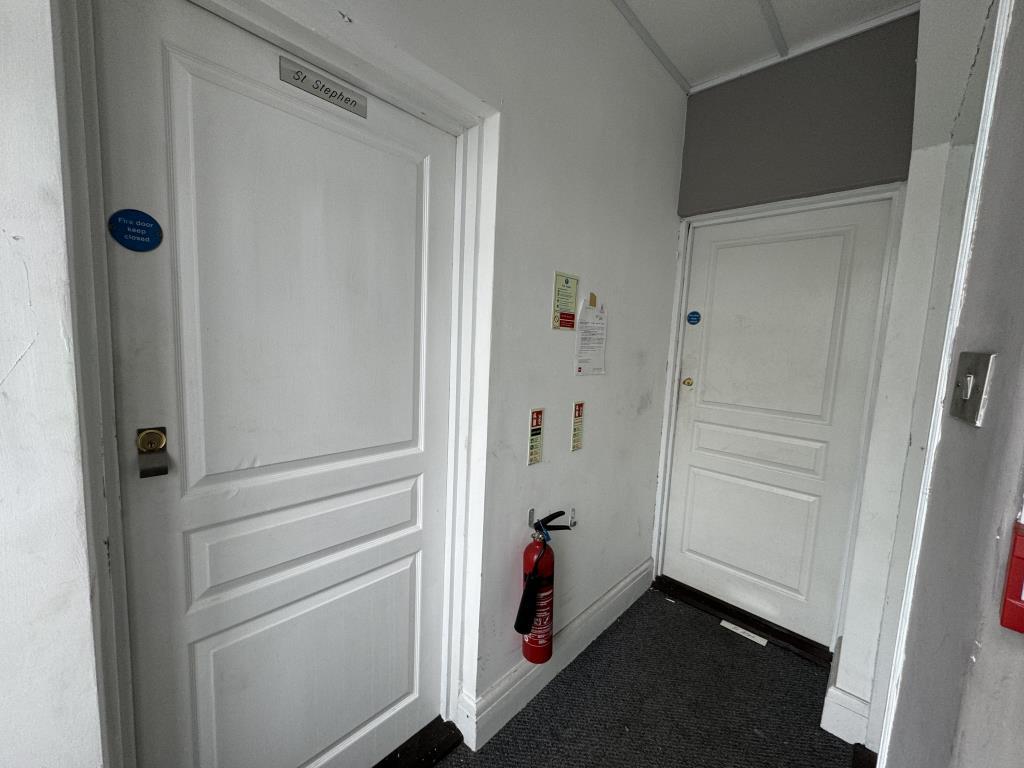 Landing with entrances to flats