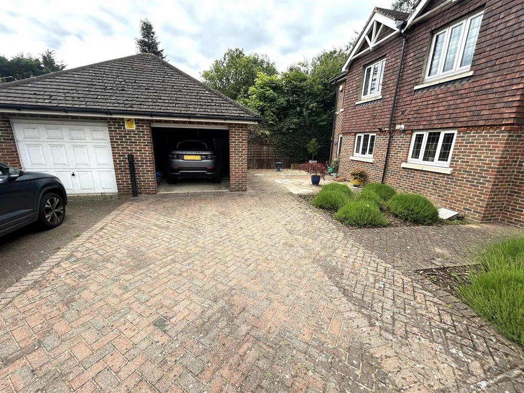 FRONTAGE, GARAGE &amp; PARKING