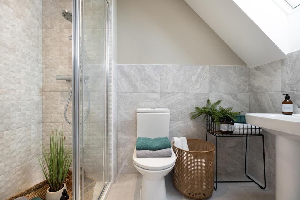 Bedroom 1 boasts its own en suite shower room