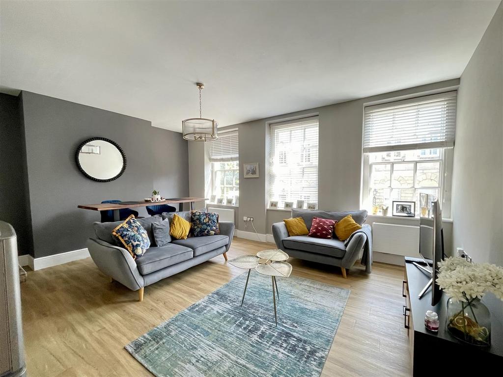 Open plan sitting room and kitchen