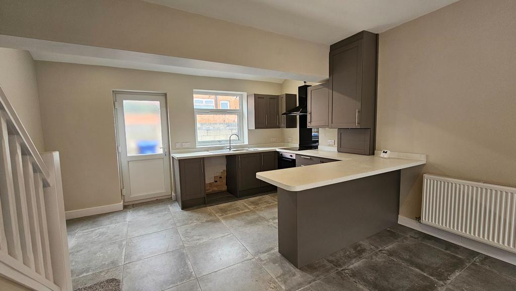 Open plan kitchen and lounge