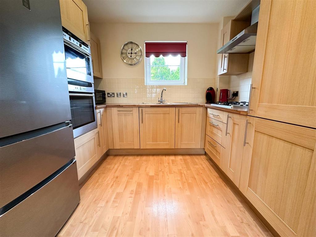 Open plan lounge kitchen dining room