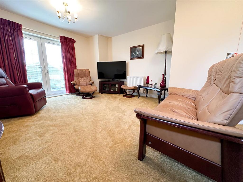 Open plan lounge kitchen dining room