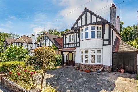 12 Dudley Grove, Epsom, KT18 7NB