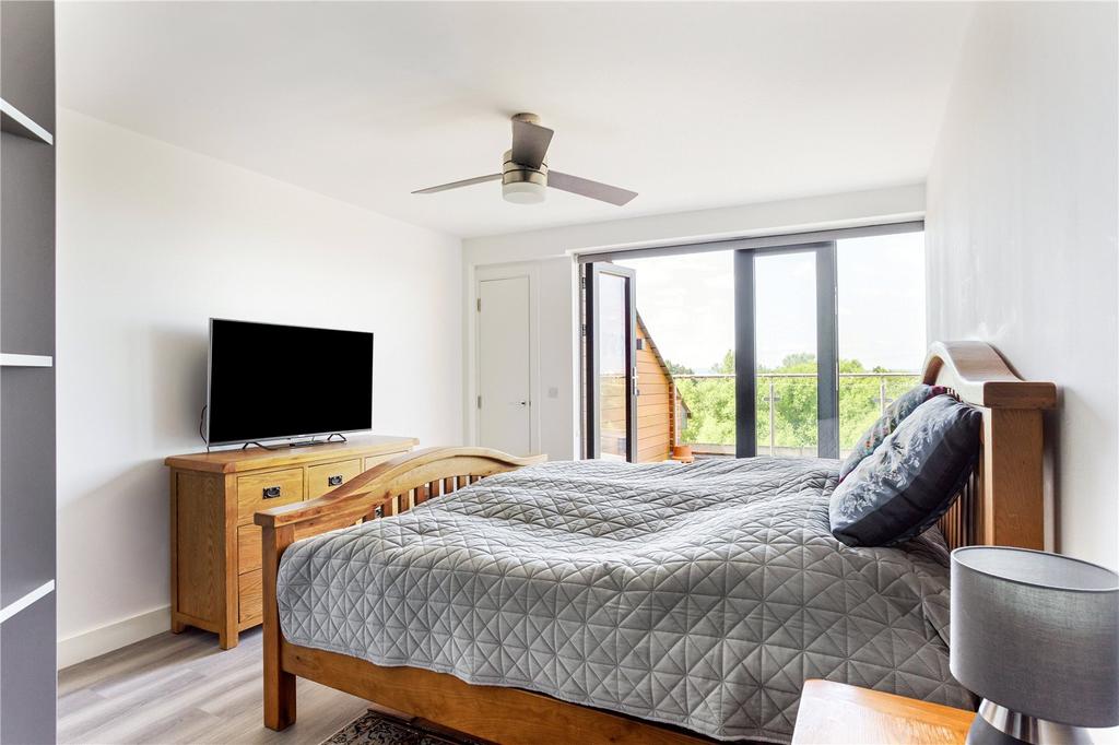 Bedroom With Balcony