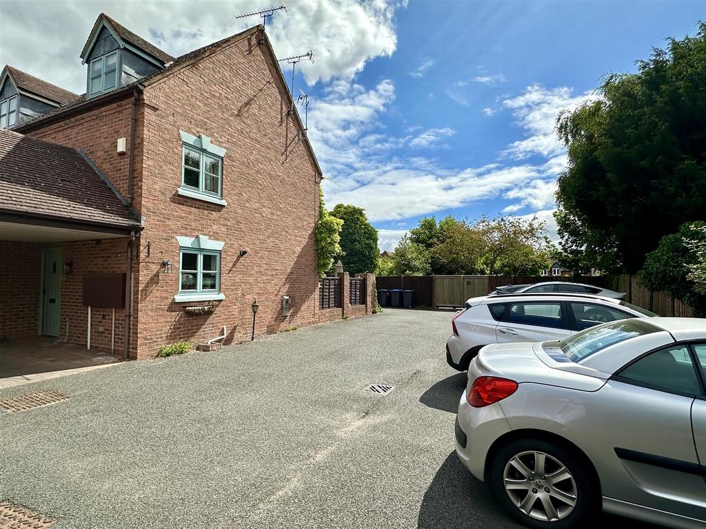 Rear courtyard parking