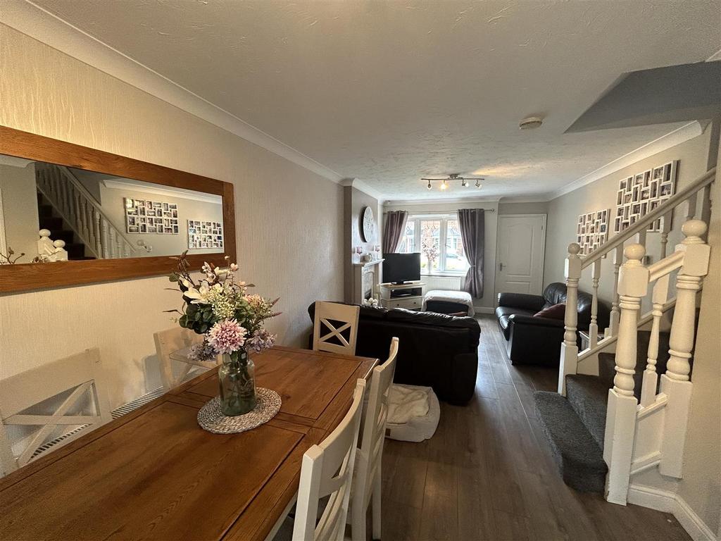 THROUGH LOUNGE & DINING AREA