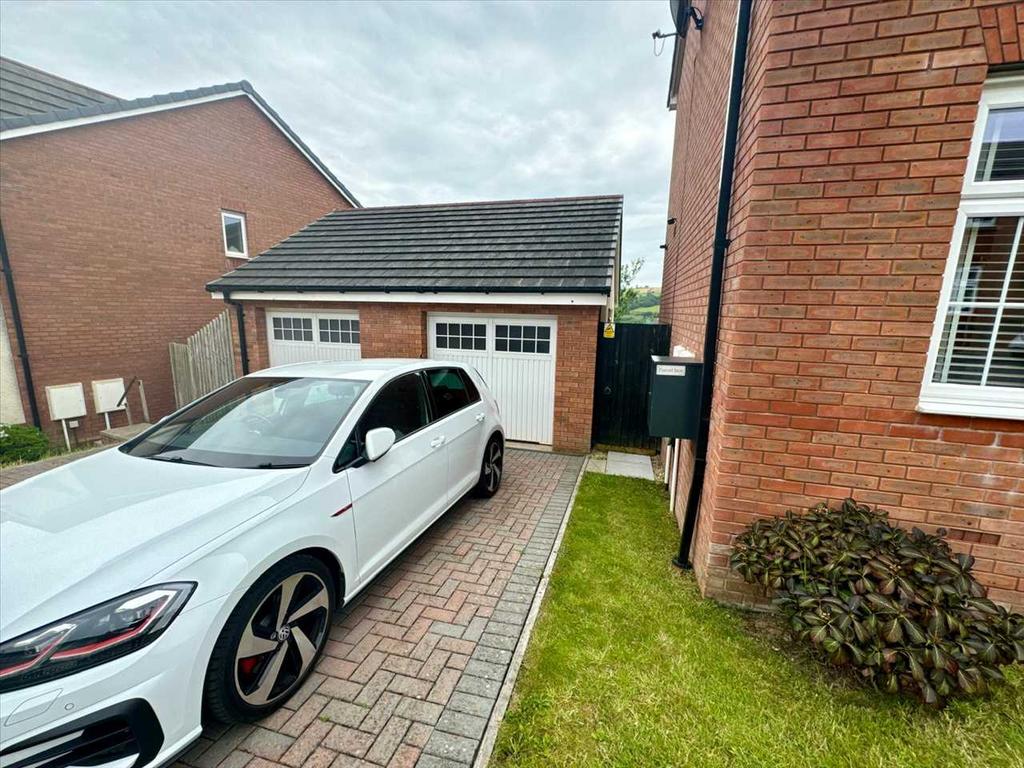 Garage With Driveway