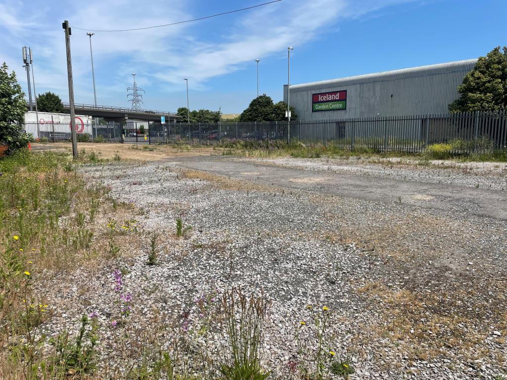 View of site to south with hardstanding area and f