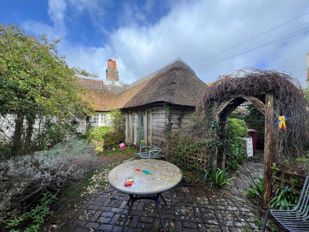 Thatched cottage with patio garden