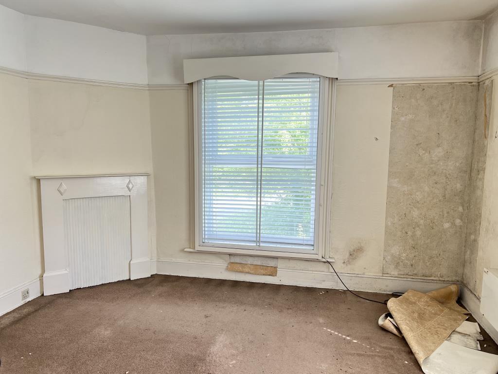 Bedroom with beige carpet