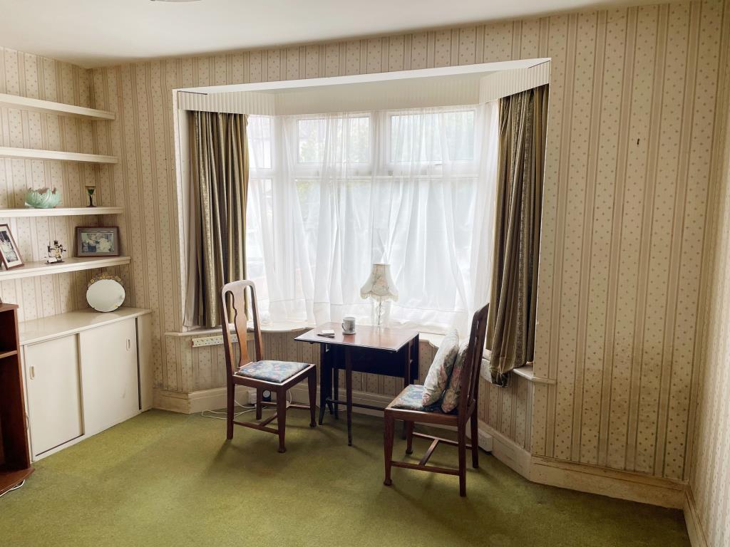 Dining room with window to front of house