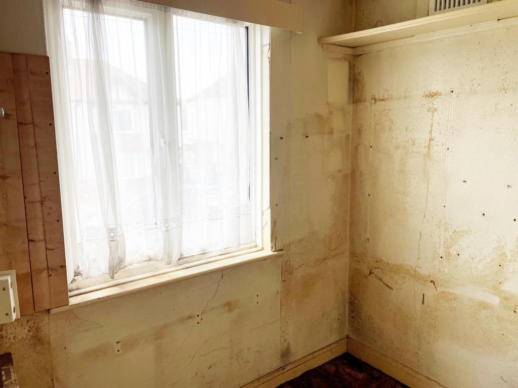 Third single bedroom with window to rea
