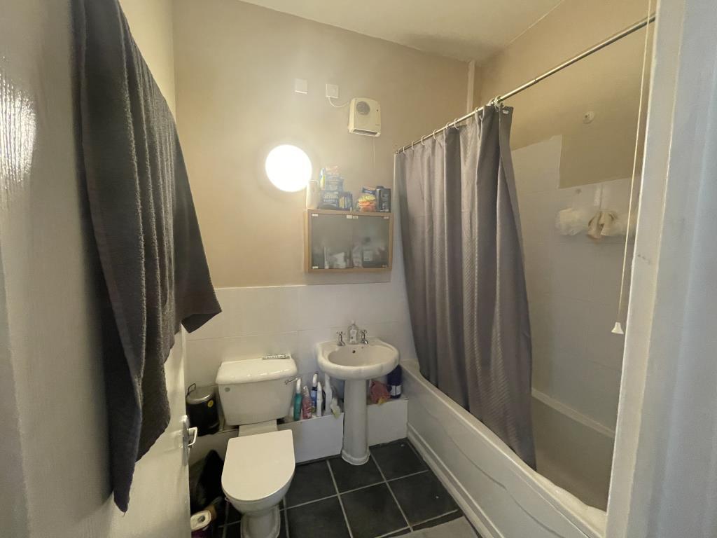Inside image of bathroom from hallway