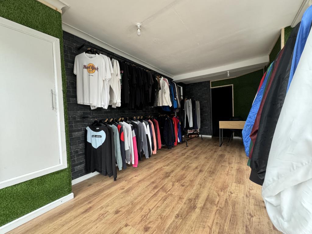 Smaller Shop unit, currently a clothes store