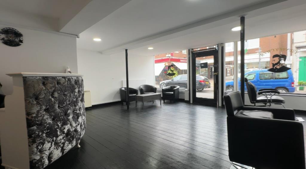 Reception and waiting area to salon