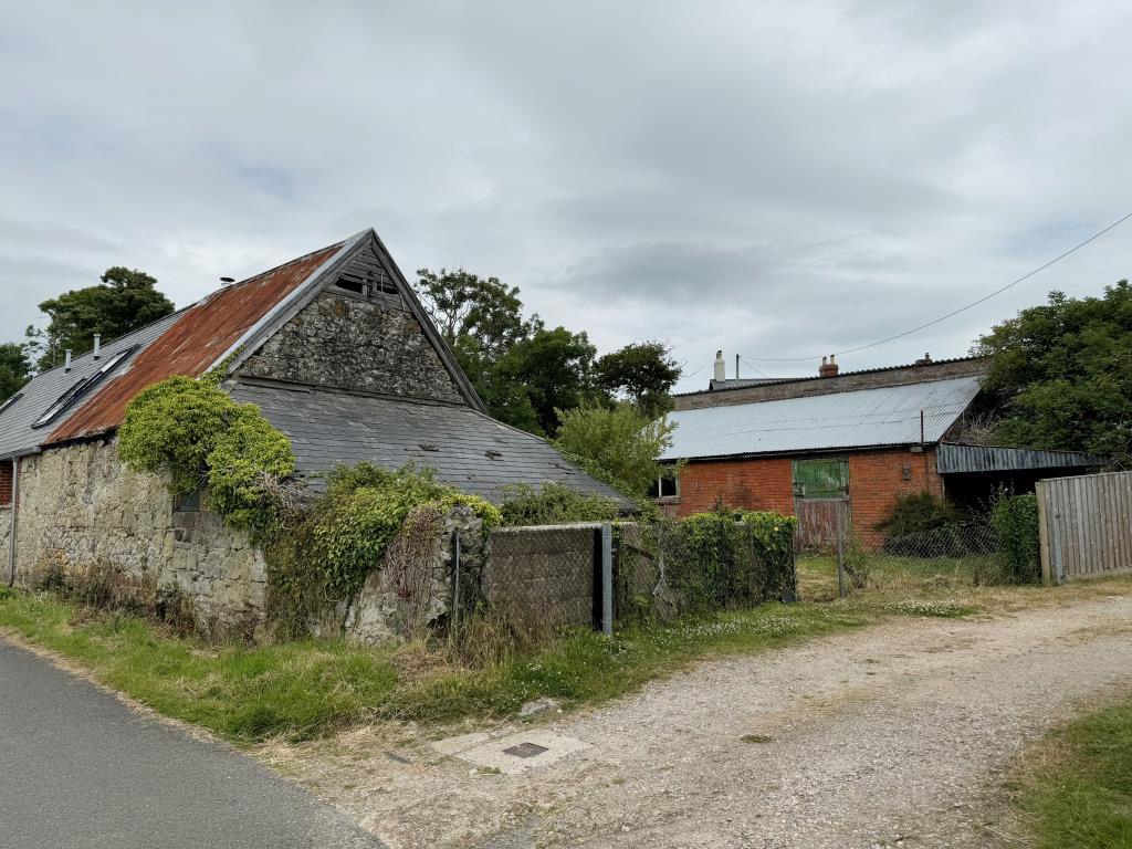 A view of both barns from the lane