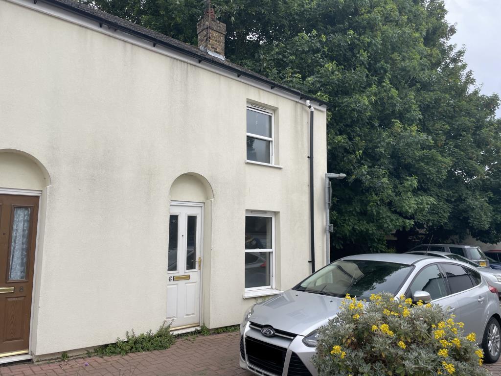 Front view of house in need of refurbishment