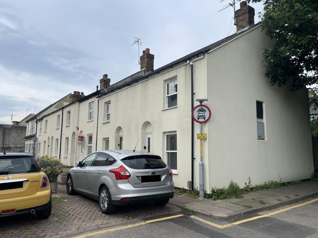 Street scene of house in need of refurbishment