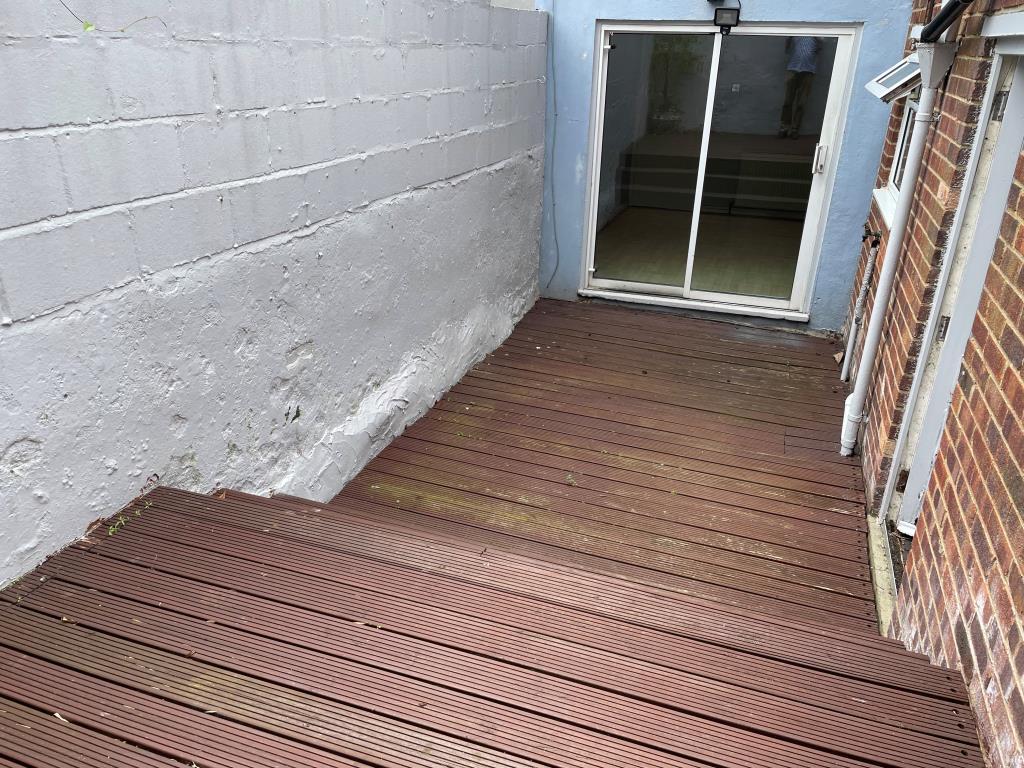 View of patio and sliding doors to living room