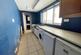 Galley style kitchen with side window