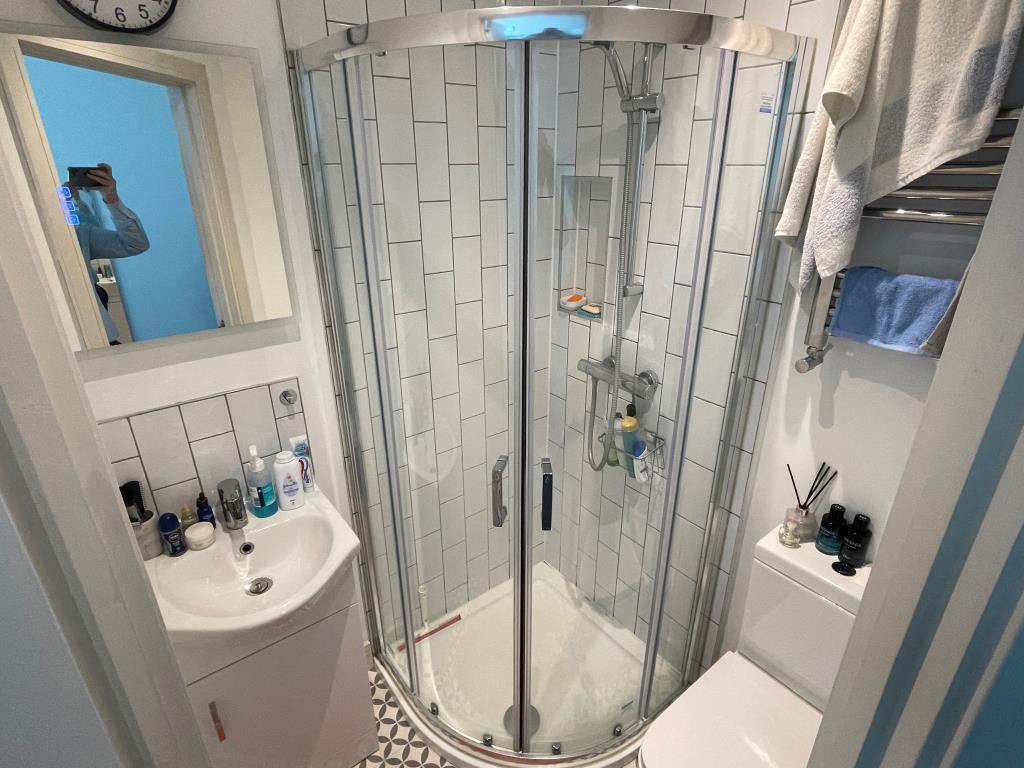Room three shower room with W.C.