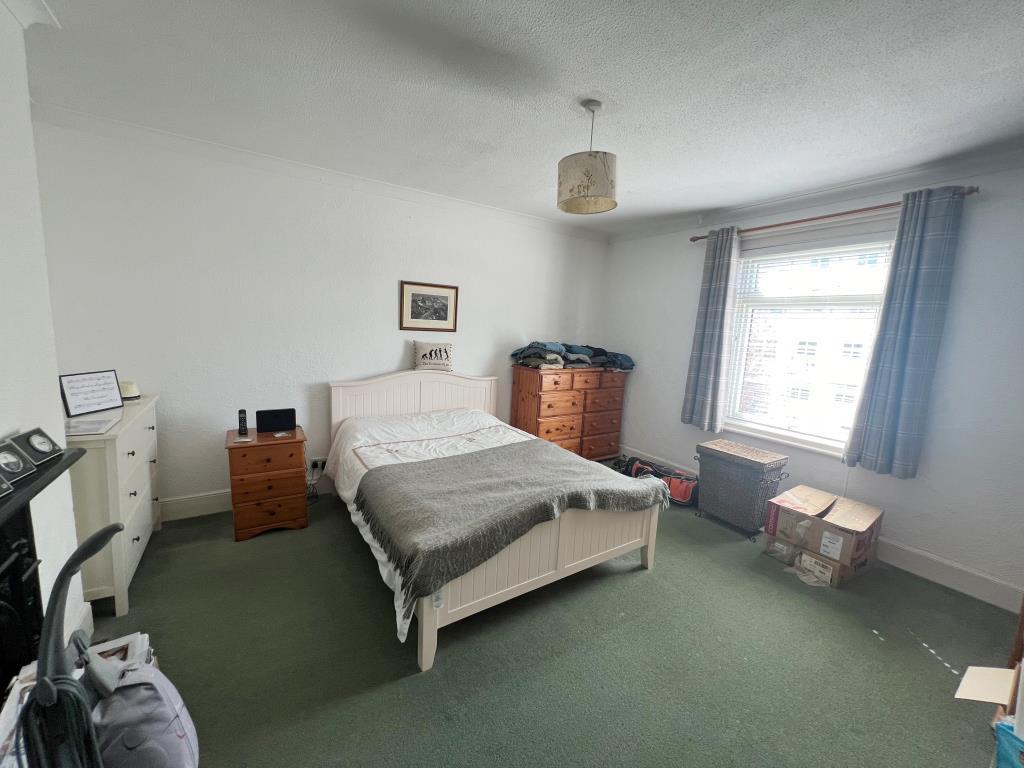 Double bedroom with original fire place