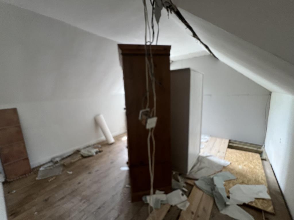 The bedroom to the front of the cottage