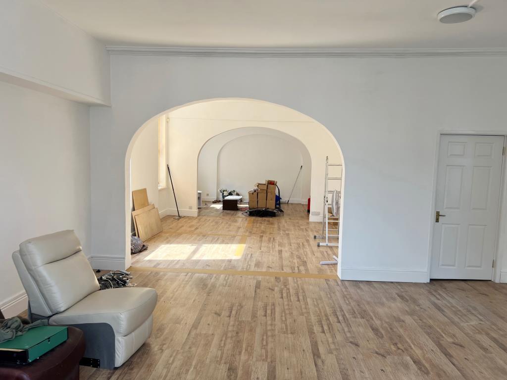Internal view with white painted walls and wood ef