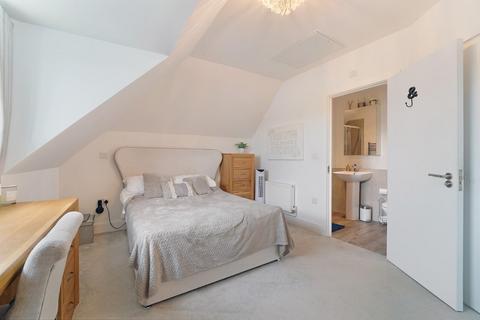 70 De Burgh Gardens, Tadworth, KT20 5LH