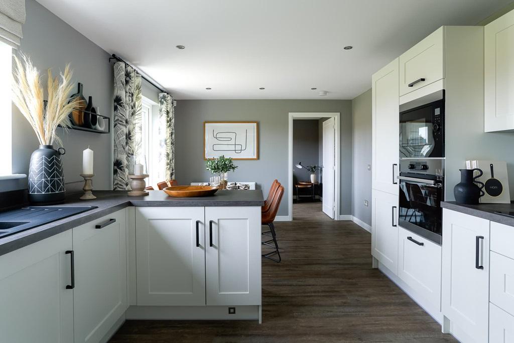 The spacious kitchen offers plenty of storage