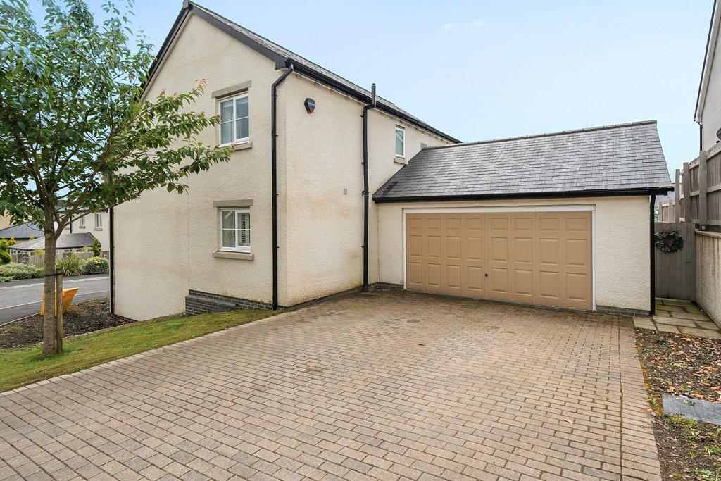 Paved Driveway and Garage