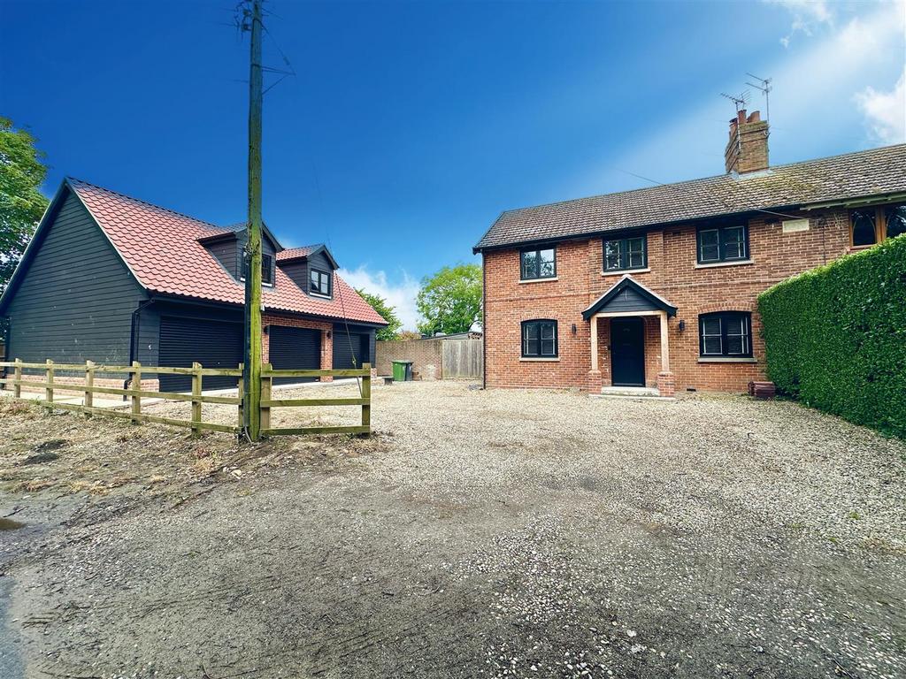 Front aspect and driveway