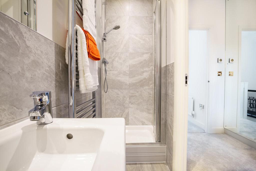 Enjoy having your own en suite shower room to...